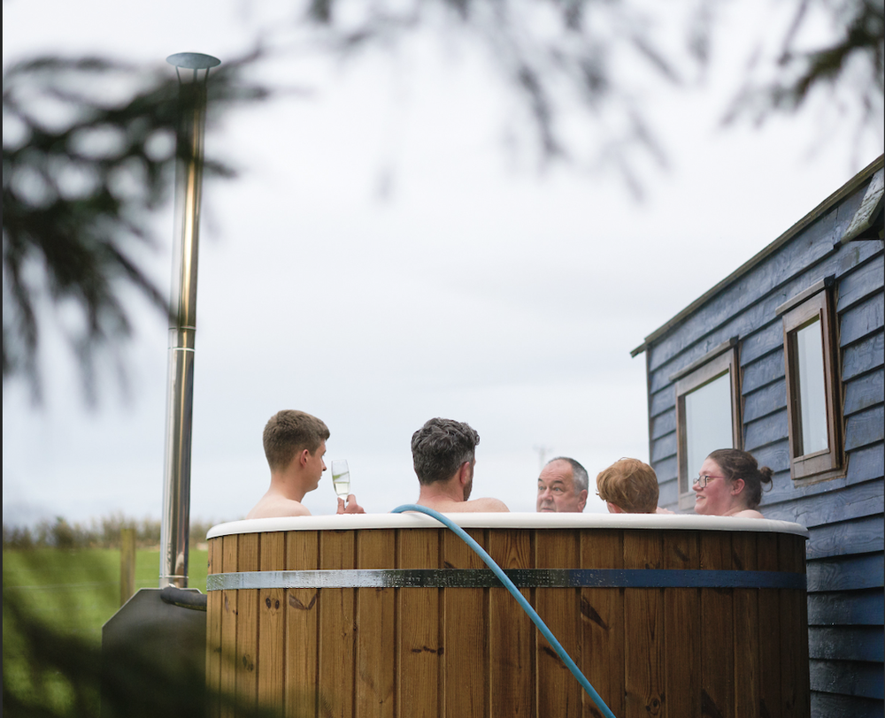 the loft hot tub glamping